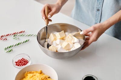 Spooning out of a stainless steel mixing bowl