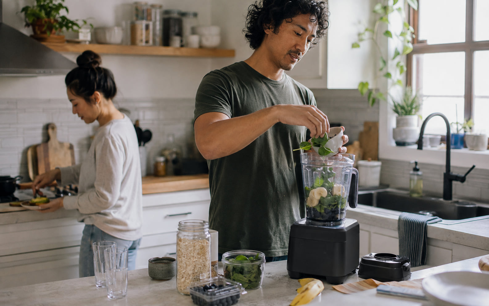 Editorial scene showing a generic blender used in an ordinary repeated breakfast or meal routine with cleanup space visible.